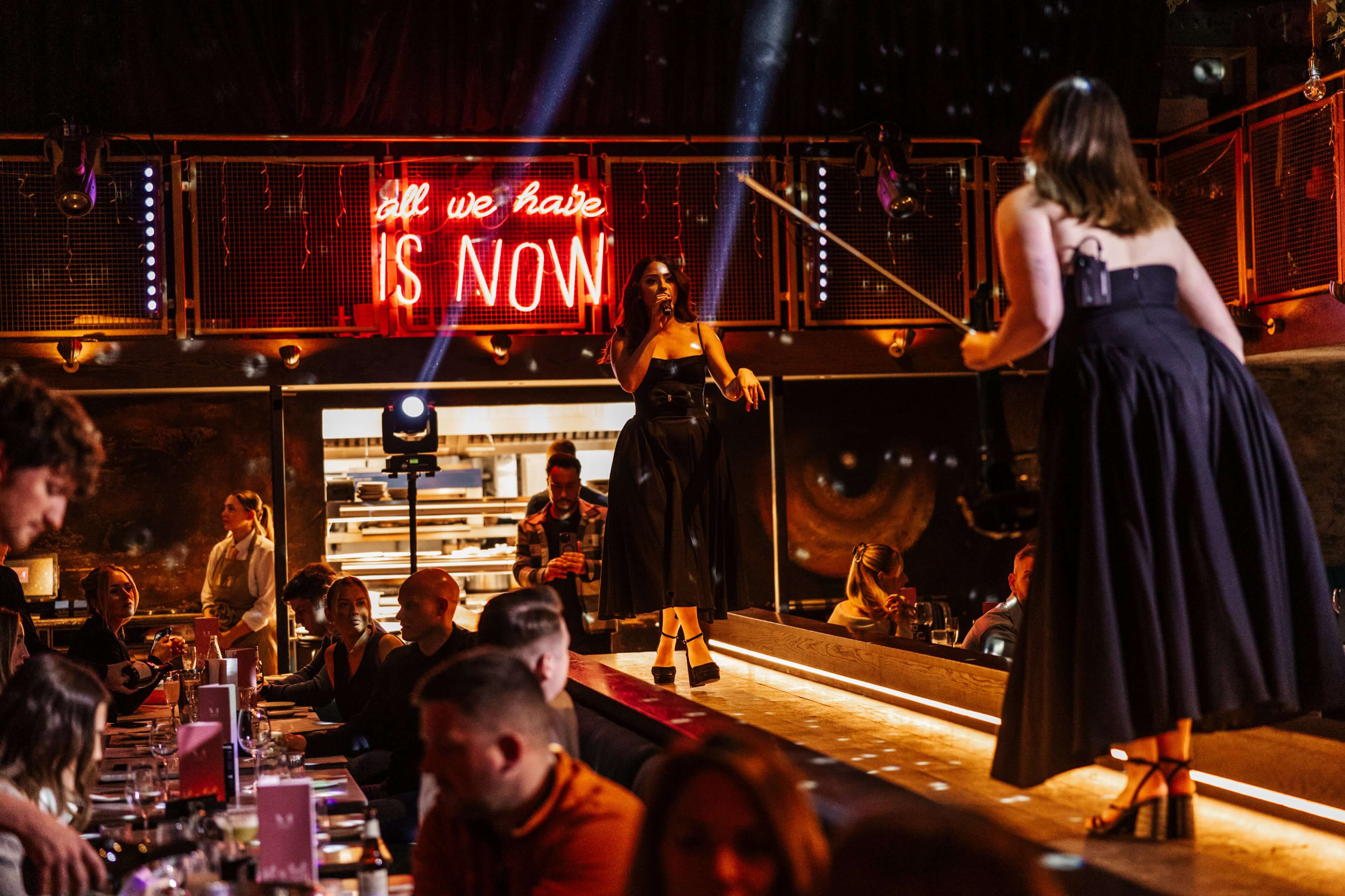 People singing and dancing with the band