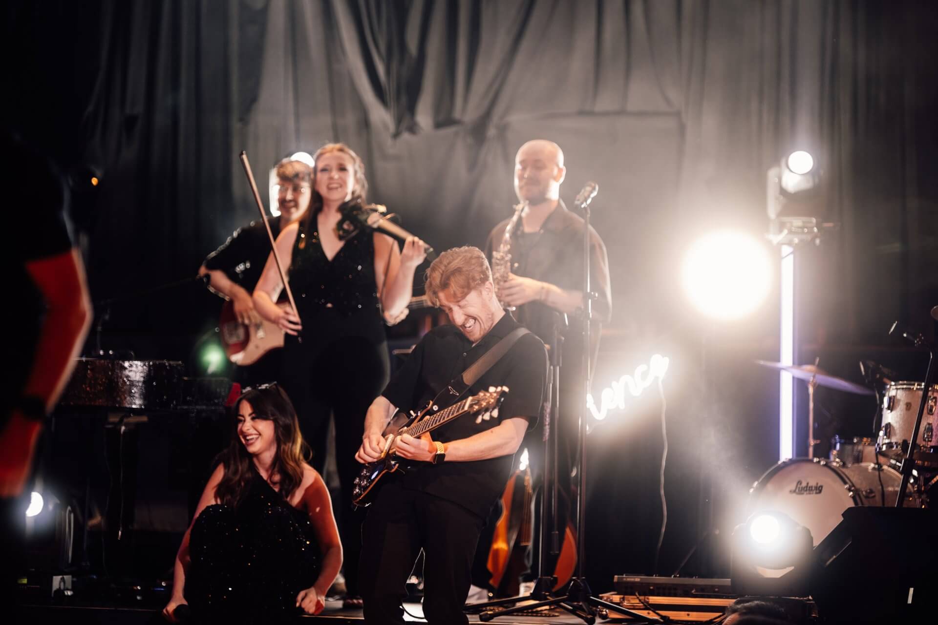 The DFC team dancing and singing